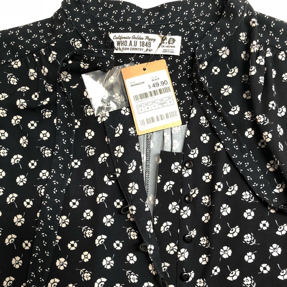 Long-sleeved, patterned romper - Picture 3 of 3